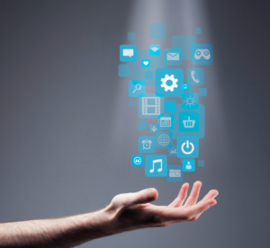 Imagem conceitual de tecnologia e inovação. Uma mão humana protegida para cima parece segurar ou interagir com um conjunto de ícones digitais azuis flutuantes, representando diferentes aplicações e funções tecnológicas, como música, internet, configurações, comunicação e comércio eletrônico. Os ícones emergem em um efeito de luz brilhante contra um fundo escuro, transmitindo uma sensação de conexão digital e interatividade em conjunto com o sistema dentista 24 horas no atendimento de urgência e emergência.